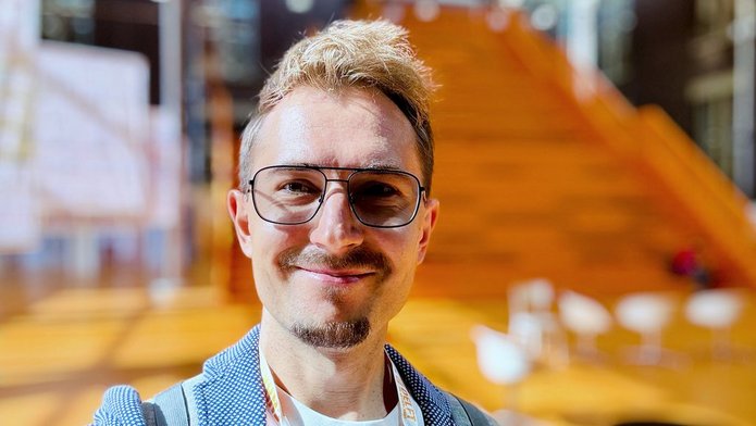 a portrait photo of Dr Zasina