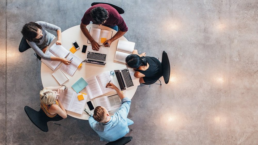 a decorative element: sitting at a table and studying students