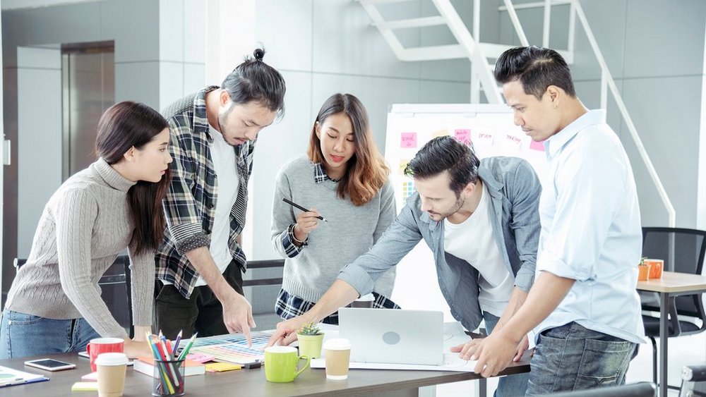 a decorative element: a group of people working together