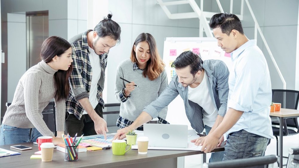 a decorative element: a group of people planning some activity